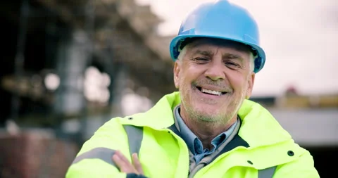 Face, engineer and happy man at construction site for development, building or Stock Footage 337026435
