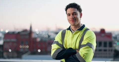 Face, engineer and happy man with confidence on city rooftop, pride or civil Stock Footage 342732680
