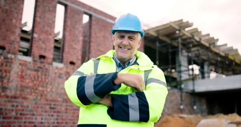 Face, engineer and man at construction site with confidence, development and Stock Footage 337027295