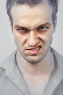 Face of evil angry man Stock Photos