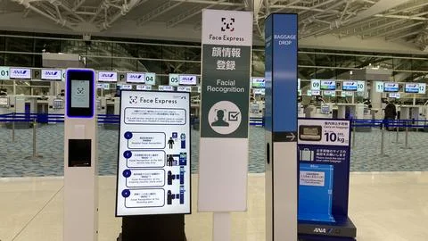 Face Express facial recognition registration kiosk and automated baggage dr.. Stock Photos