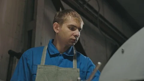 Face factory workman during working on professional cutting machine Stock Footage 83420098