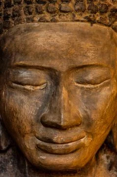 Face front of stone Buddha Stock Photos