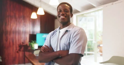 Face, funny and black man in office, arms crossed and confidence for copywriting Stock Footage 329459241