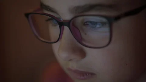 Face Girl is Looking at Digital Tablet Computer Screen With Glasses. Child .. Stock Footage 290213053
