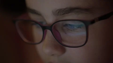 Face Girl is Looking at Digital Tablet Computer Screen With Glasses. Child .. Stock Footage 312065759