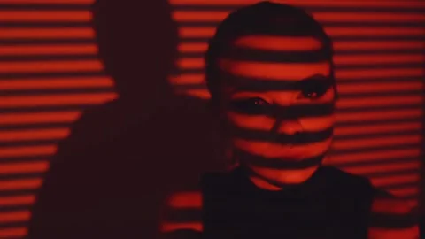 Face of a girl with an red abstract pattern of lines. Stock Footage 99931764