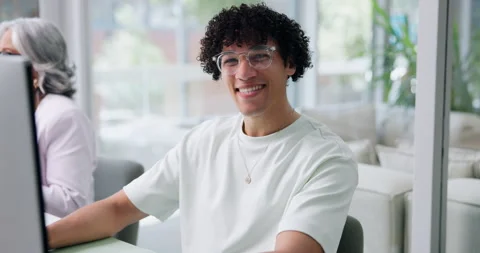 Face, glasses and smile of creative man in coworking office for design or web Stock Footage 329397612
