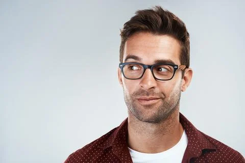 Face glasses, man and thinking with smile for future idea, problem solving and Stock Photos