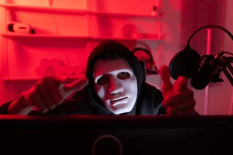 This is the face of a hacker who is knowledgeable with operating systems a... Stock-Fotos