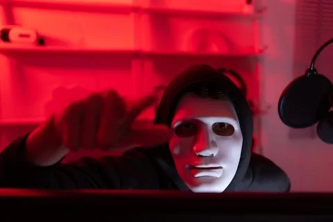 This is the face of a hacker who is knowledgeable with operating systems a... Stock-Fotos