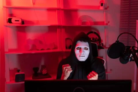 This is the face of a hacker who is knowledgeable with operating systems a... Stock-Fotos