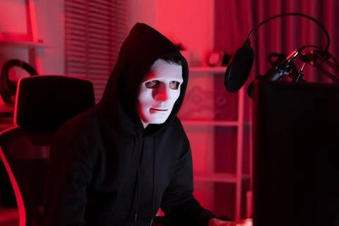 This is the face of a hacker who is knowledgeable with operating systems a... Stock-Fotos