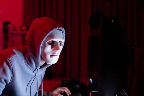 This is the face of a hacker who is knowledgeable with operating systems a... 写真素材