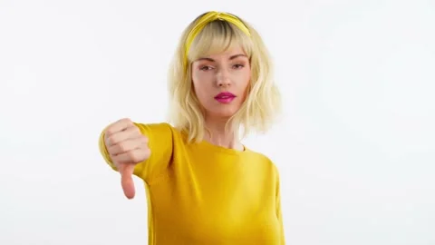 Face, hand and thumbs down by woman for negative Stock Footage 236652789