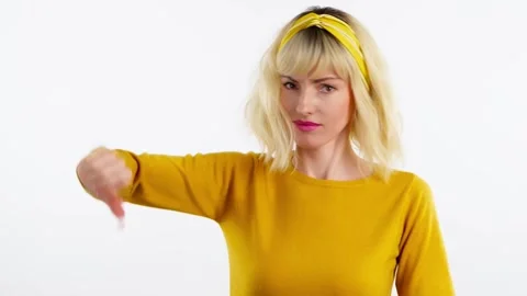 Face, hand and thumbs down by woman for negative Stock Footage 240334363