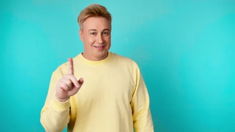 Face, hand and thumbs down by man for negative, feedback or review, finger emoji Vídeo Stock 249198549