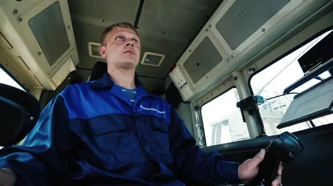 Face &amp; hands of the driver excavator  stabilization Stock Footage 51449789