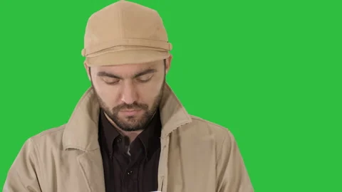 Face of handsome man using a digital tablet on a Green Screen, Chroma Key. Stock Footage 102293274