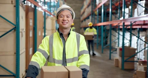 Face, happy and man with boxes at warehouse for distribution, shipping and Stock Footage 335896163
