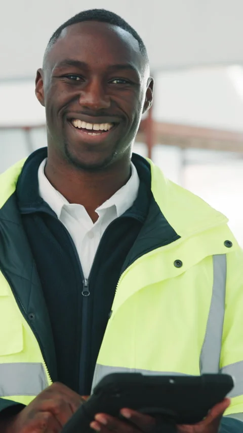 Face, happy man and construction engineer with tablet in building for quality Stock Footage 343710165