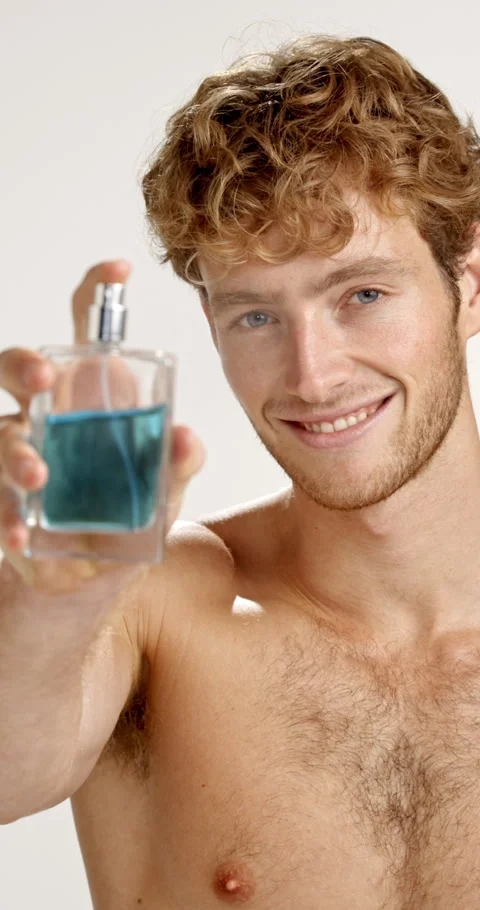 Face, happy man and spray perfume for fragrance, hygiene and fresh scent Stock-Footage 312401709