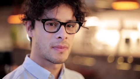 Face of happy smiling man in glasses Stock Footage