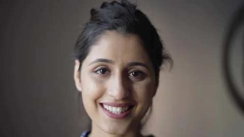 Face of happy successful Latin model enjoying shooting Stock Footage 101368119