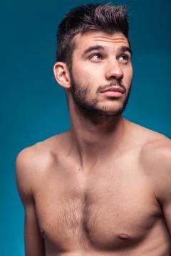 Face head shoulders, man looking above up Stock Photos