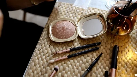 Face highlighter, powder on the table seen up close Stock Footage 121040826