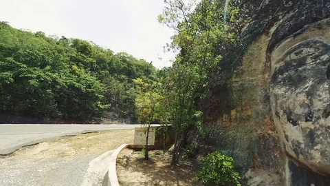 Face of Indian carved in a big rock in Puerto Rico Stock Footage 78079093
