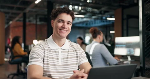 Face, laptop and programming with man at work for about us, satisfaction or web Stock Footage 340605984