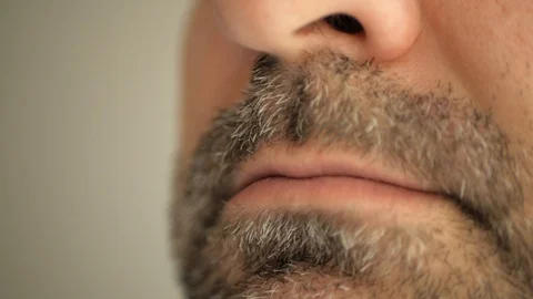 Face, lips of a man with a gray beard. Super macro close-up. Stock Footage 127698324