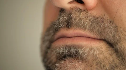 Face, lips of a man with a gray beard. Super macro close-up. Stock Footage 127698349