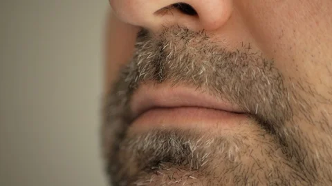 Face, lips of a man with a gray beard. Super macro close-up. Stock Footage 127698353