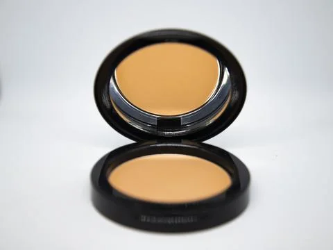 Face Make-up powder on white background. Bridal makeup powder. Stock Photos