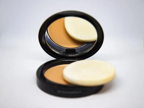 Face Make-up powder on white background. Bridal makeup powder. Stock Photos