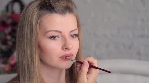 Face Makeup Making Lips Brush.
Young Mediterranean girl applying make up 스톡 동영상 72869090