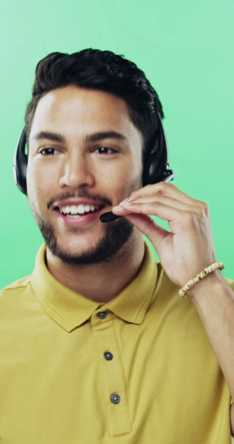 Face, man and call center consultant in studio for help, technical support and Stock Footage 334905808