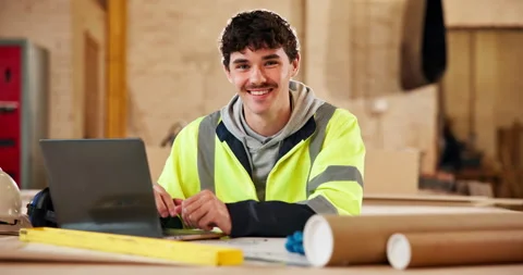 Face, man and carpenter in factory with laptop, project research or happy for Stock Footage 338101708