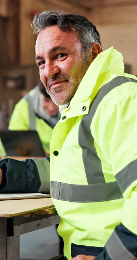 Face, man and carpenter in workshop with smile, manufacturing supervisor and Stock Footage 348124080