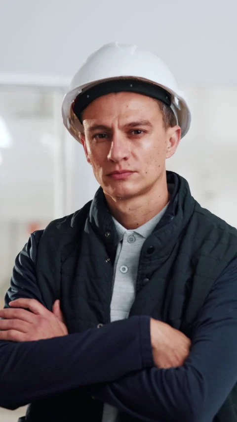 Face, man and contractor at construction site, confidence and development with Stock Footage 342312614
