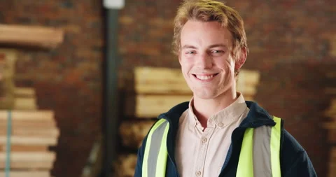 Face, man and happy for carpentry in workshop with joinery experience, skilled Stock Footage 341394564