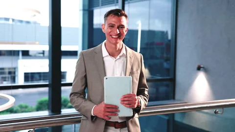 Face, man and happy with tablet in office for corporate banking, risk management Stock Footage 346940748