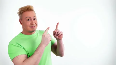 Face, man and pointing to mockup. Advertising, branding, guy male mock up 動画素材 238534394