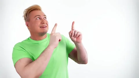 Face, man and pointing to mockup, advertising, branding in studio isolated on wh Stock-Footage 244871590
