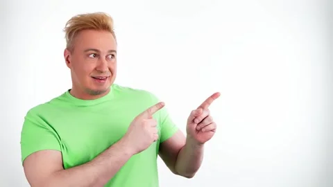 Face, man and pointing to mockup, advertising, branding in studio isolated on wh Stockbeeldmateriaal 244871596