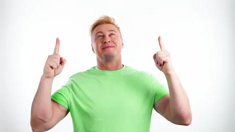 Face, man and pointing to mockup. Advertising, branding, smiling guy male showin Video stock 245569929