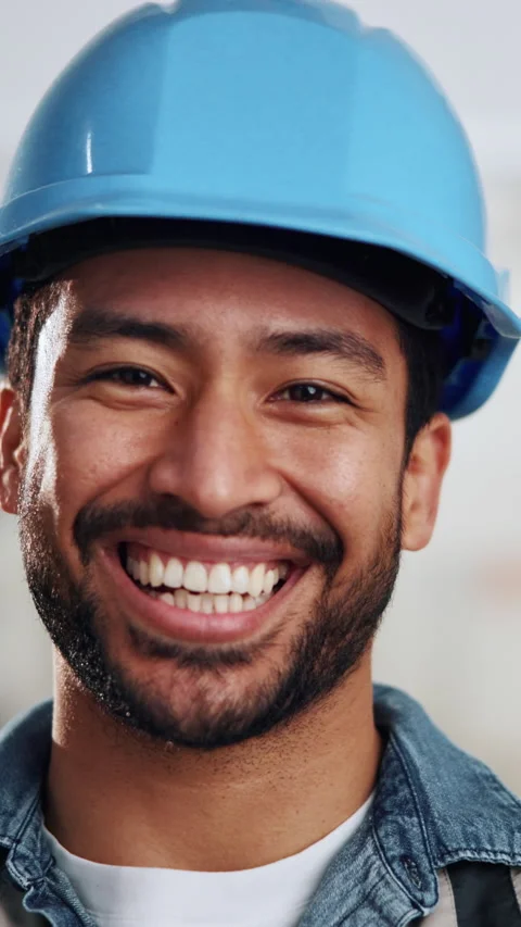 Face, man and worker at construction site, smile and development with helmet for Stock Footage 342312861