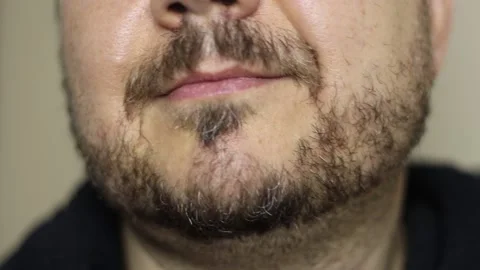 Face of a man with a beard who hasn't shaved Video stock 167686021